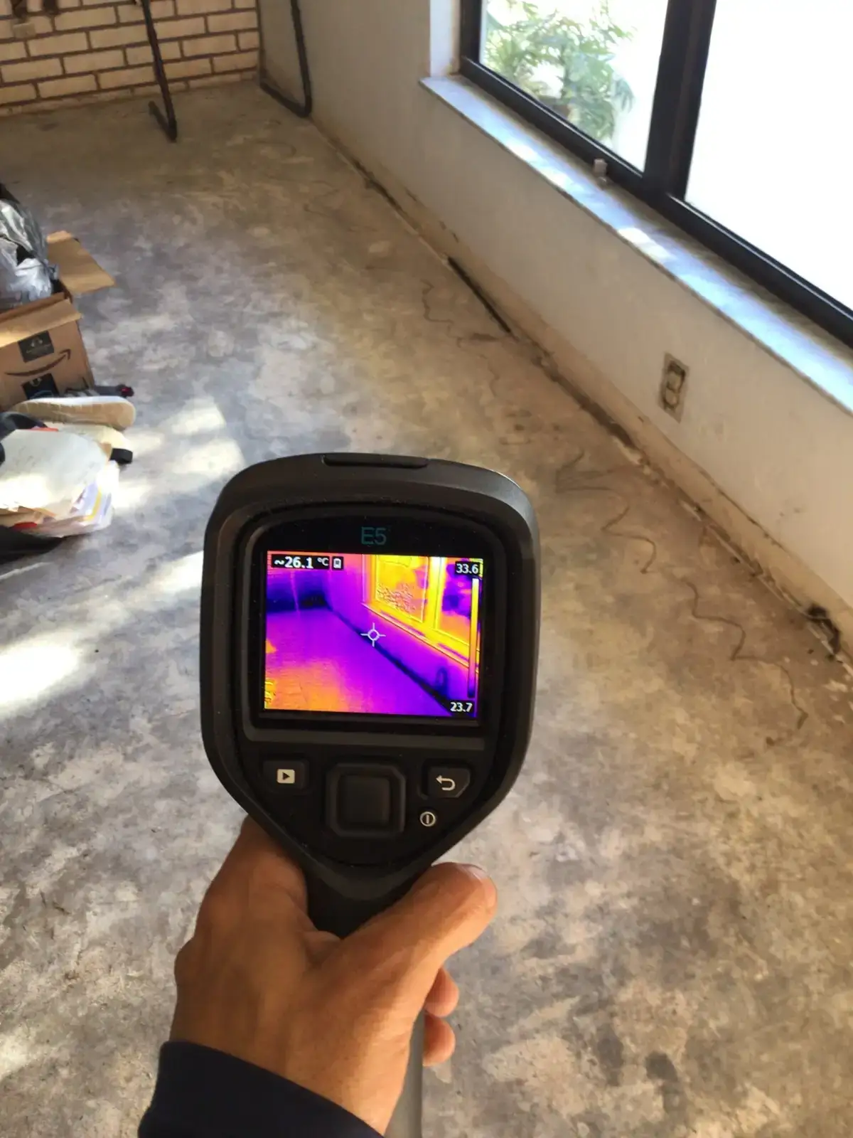 Thermal and moisture detection equipment used during water damage inspection.