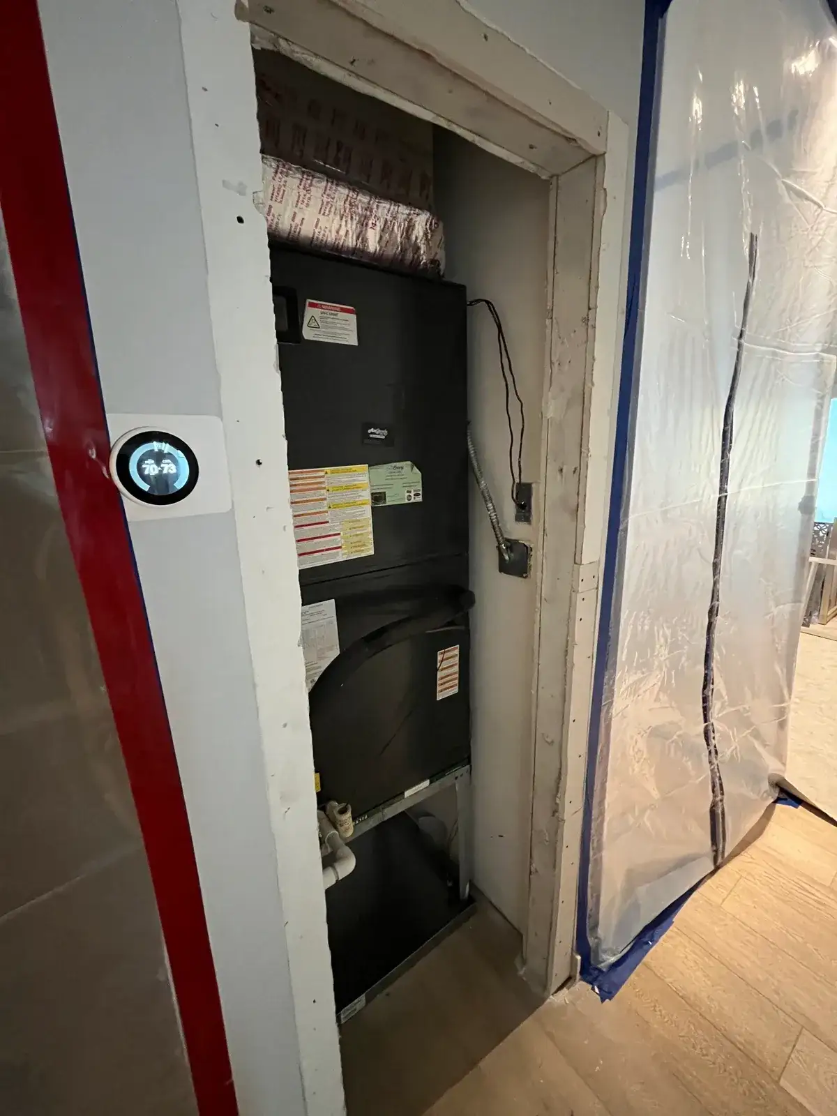 Containment around an AC-related mold remediation area.