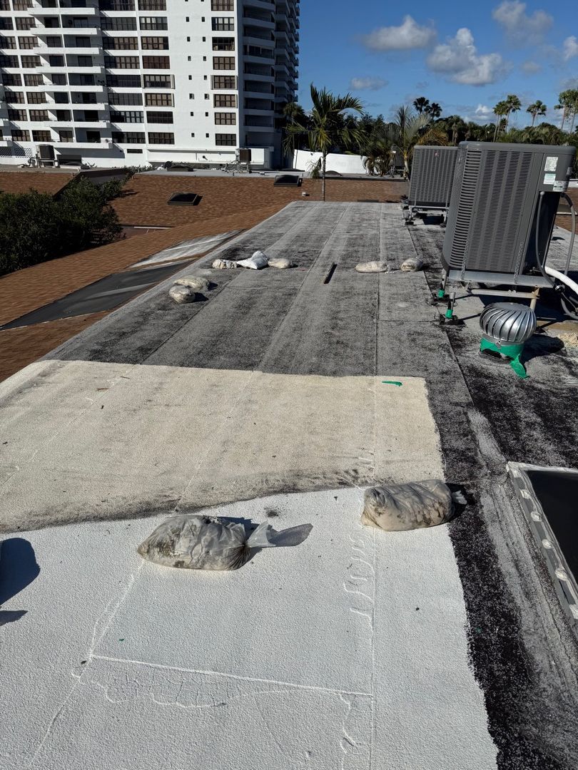 Roof damage before and after tarp installation showing professional protection